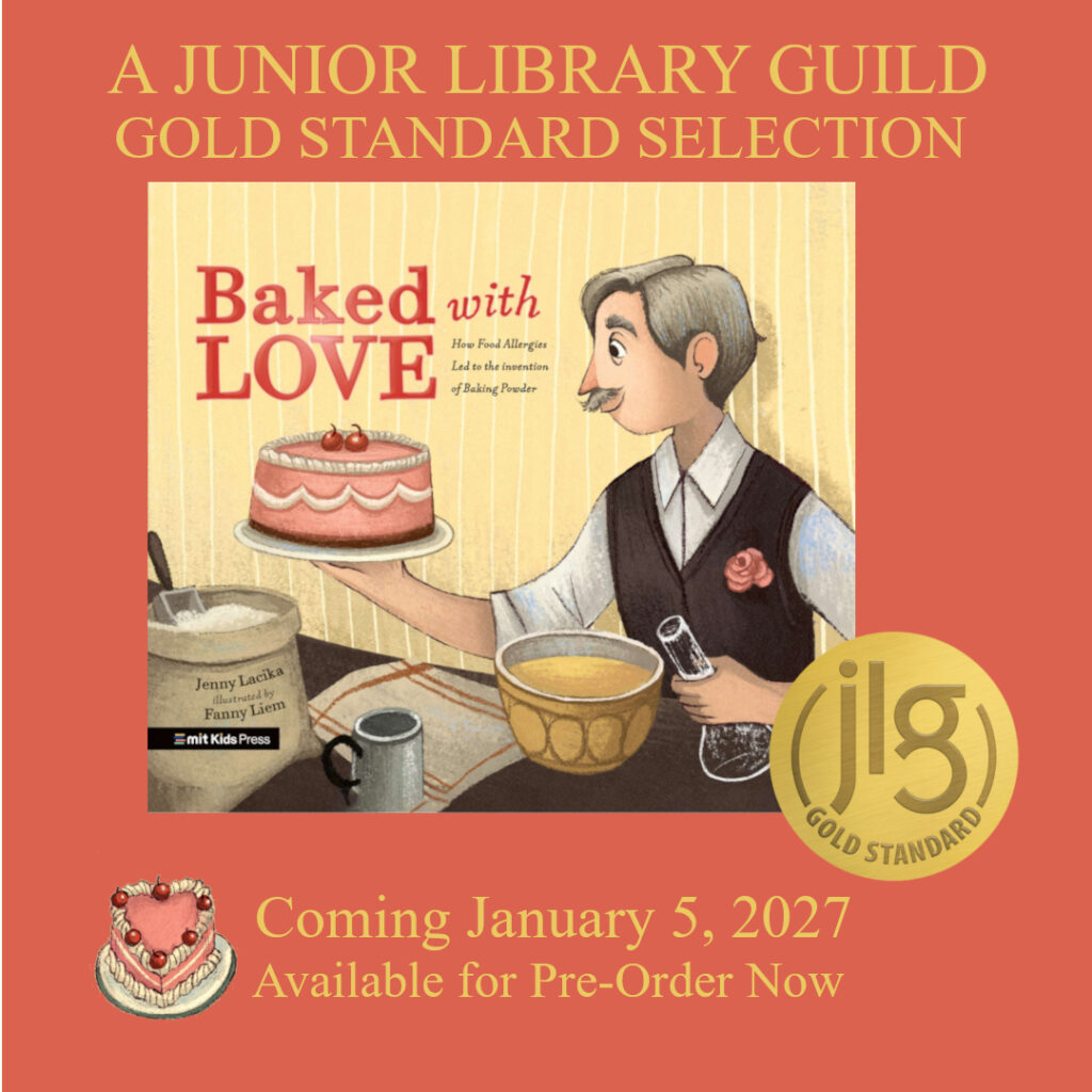 Text reads, "A Junior Library Guild Gold Standard Selection" above the cover of Baked With Love: How Food Allergies Led to the Invention of Baking Powder featuring an illustration of Alfred Bird holding a cake in one hand and an Erlenmeyer flask in the other with a bag of flour and mixing bowl nearby. The Junior Library Guild Gold Standard Seal is off to the right. Below is a heart-shaped cake beside the text, "Coming January 5, 2027. Available for Pre-Order Now."